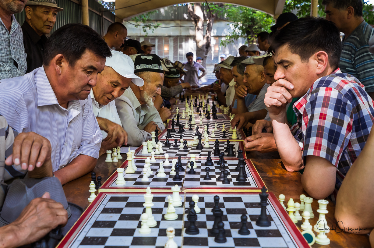 Not only consumer goods is sold at the market. People also meet to interact, here a tournament of chess