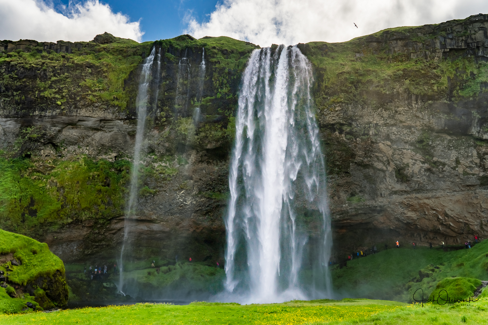 Seljalandsfoss waterfall. Notice the people walking behind it