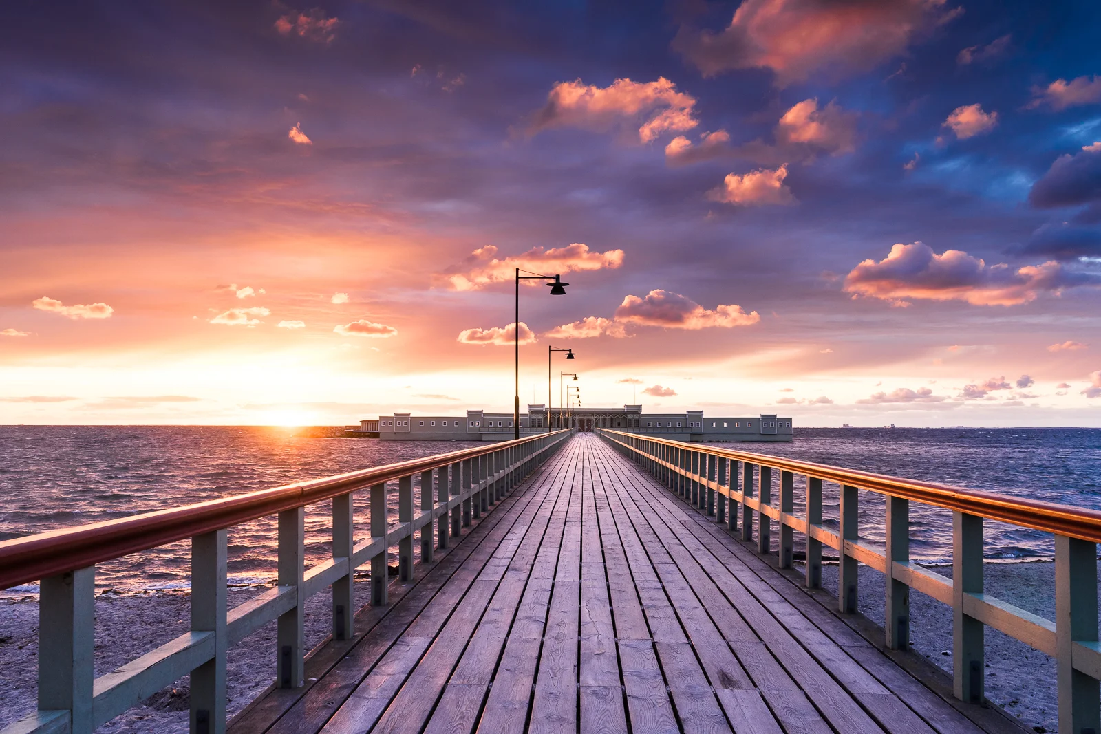 Malmö kallbadhuset during sunset.