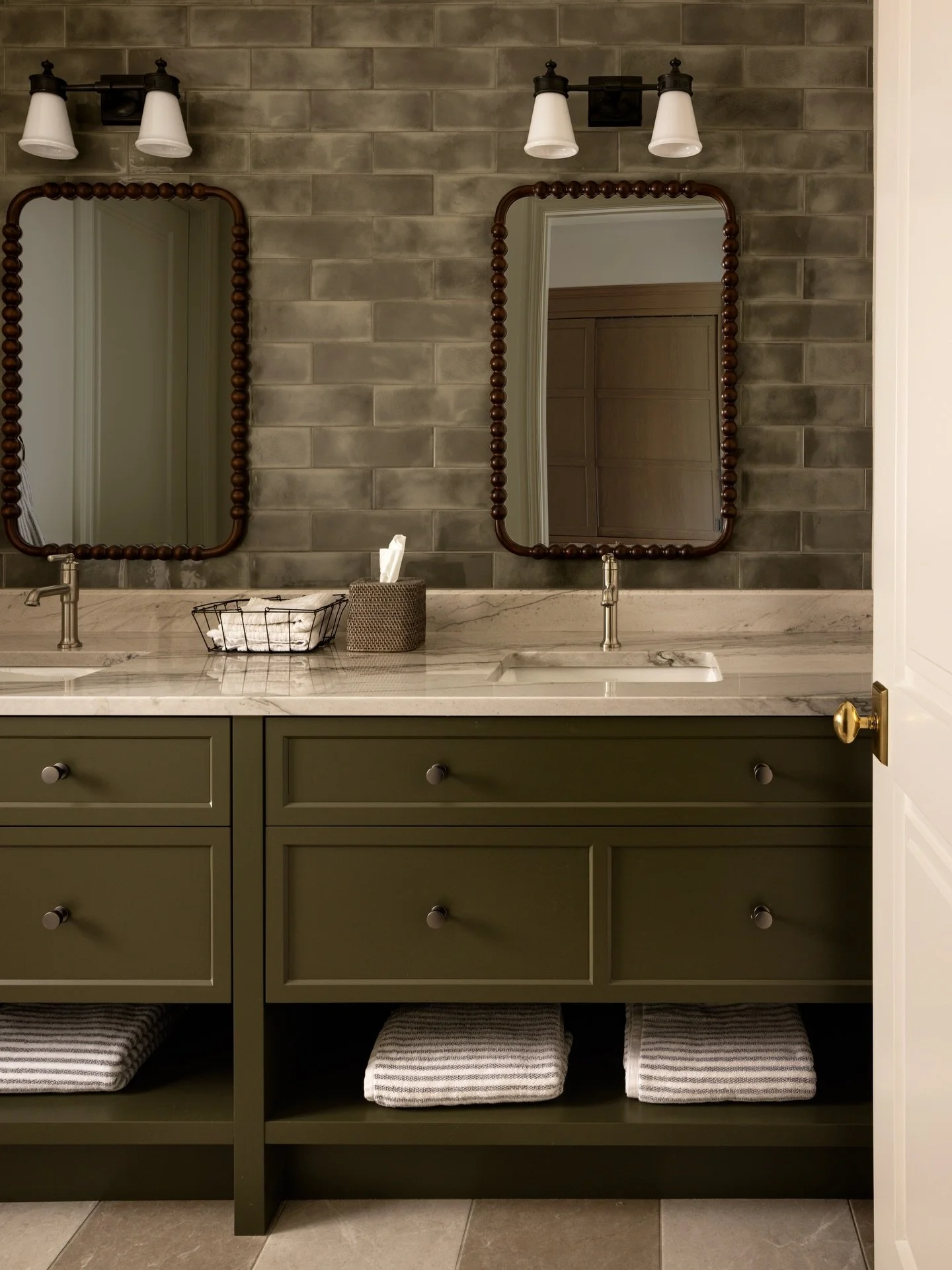 When used on millwork or permanent fixtures, green becomes less of an accent and more of a foundation. 

It brings depth to a room while feeling calm and liveable, especially when paired with warmer finishes and natural materials.

A quiet statement 