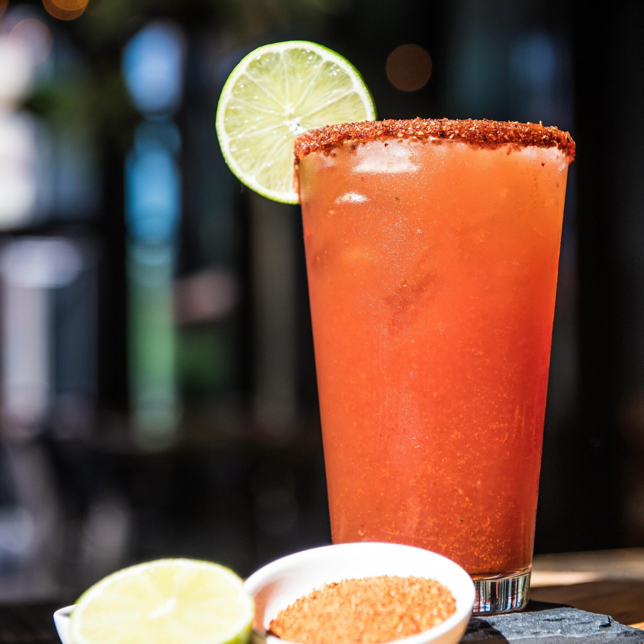 We have got the perfect companion for your day- the ultimate Michelada delight. Spice up your day with a kick! To find your nearest location, visit us online at https://www.Moctezumas.com/.