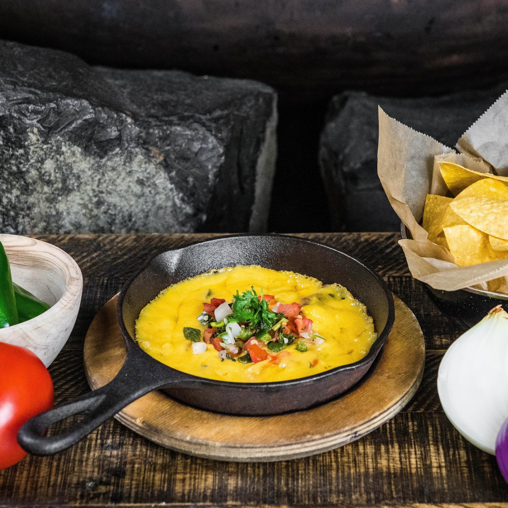 Dip into cheesy bliss with our Fiesta Queso dip. A dip so divine, it&rsquo;s impossible to resist. To find your nearest location, visit us online at https://www.Moctezumas.com/.