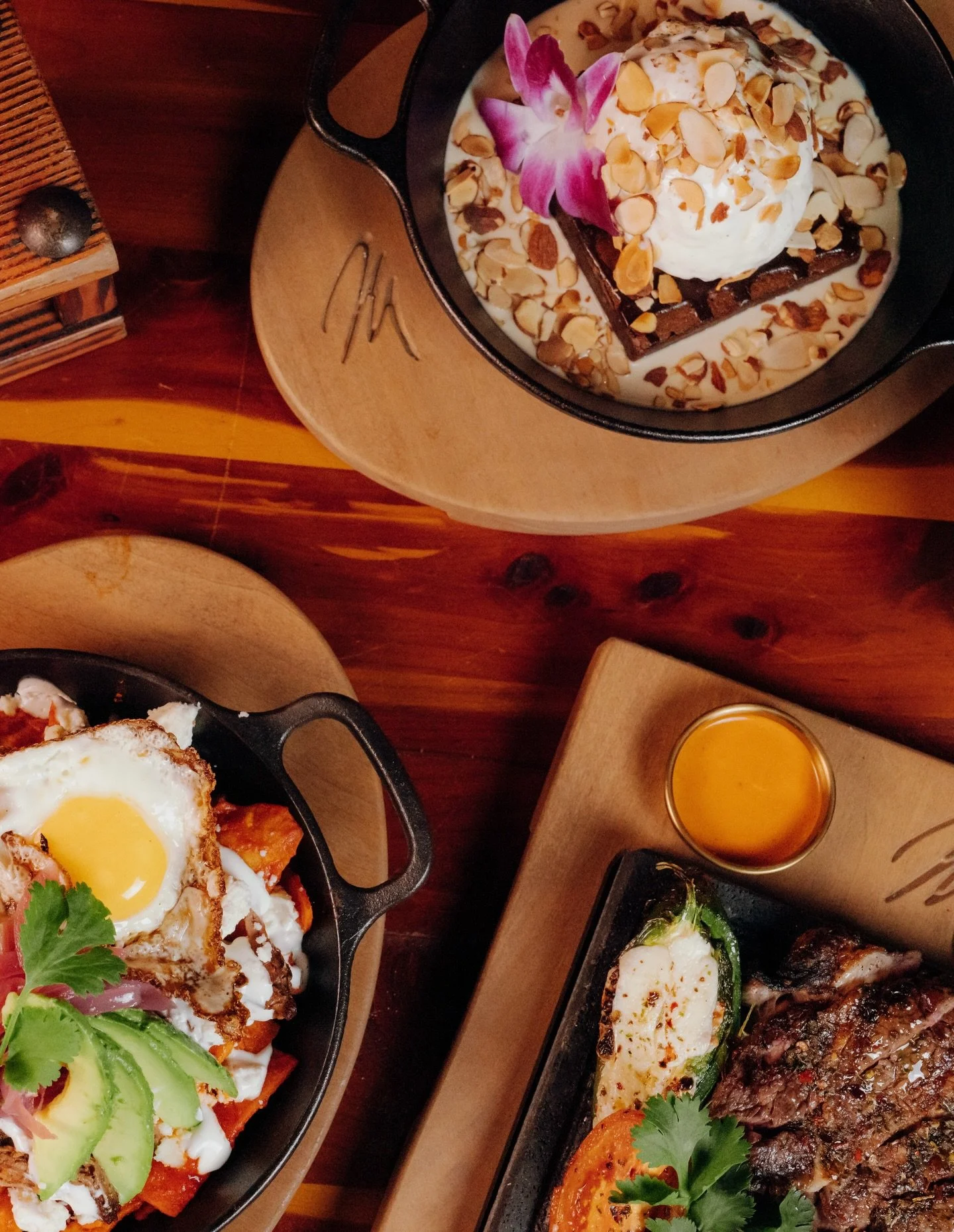 Fire meets wood.
Metal holds the heat.

Mexico lives in every detail.
Bold flavors, a little picante, a little dulce &mdash; the kind of balance you don&rsquo;t question, you just feel.

Here at Moctezuma&rsquo;s, every bite and every sip lingers&hel