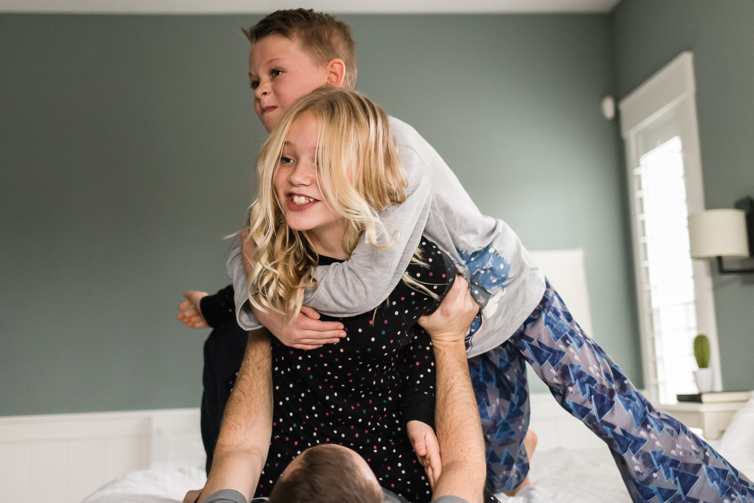 In-home family snuggle session on bed {Utah lifestyle photographer}