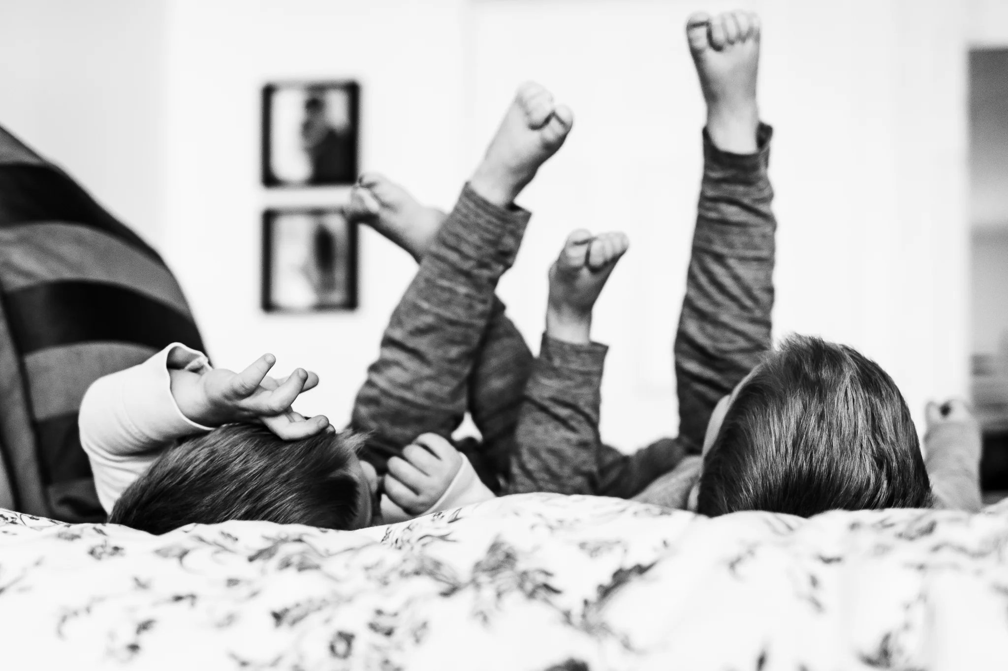 Twin brothers with feet in air - Utah lifestyle photographer