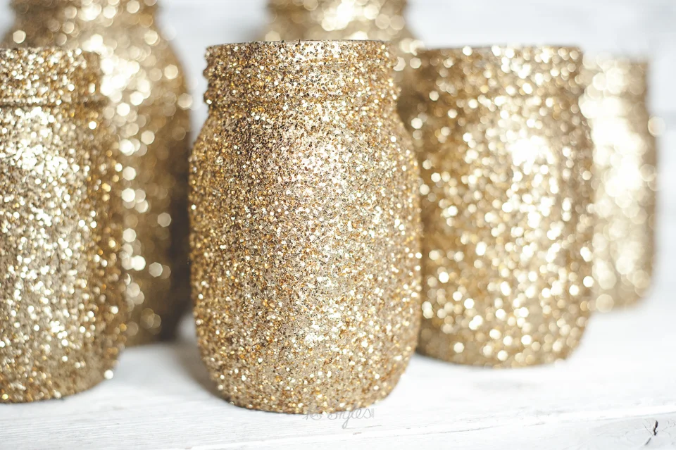 Glitz. Okay, I know the mason jar trend has gotten wildly out of hand, and most of us are ready to move on. BUT this easy DIY is a sexy way to add sparkle to your table setting. Use them to hold flatware, centerpieces or serving utensils. Whatever y…