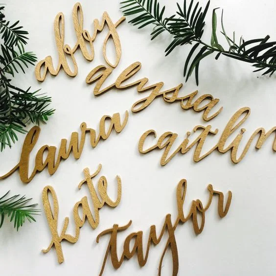 Place Cards. Keep it chic, use custom wooden names as place cards. This way all of your guest will have a unique keepsake from the party.