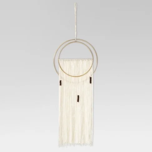 Hand Made Cotton Wall Hanging - $24.99 I've been seeing lots of woven wall hangings lately, they do a great job of adding texture and achieving that bohemian vibe. They can be pricey, so this is a great alternative.