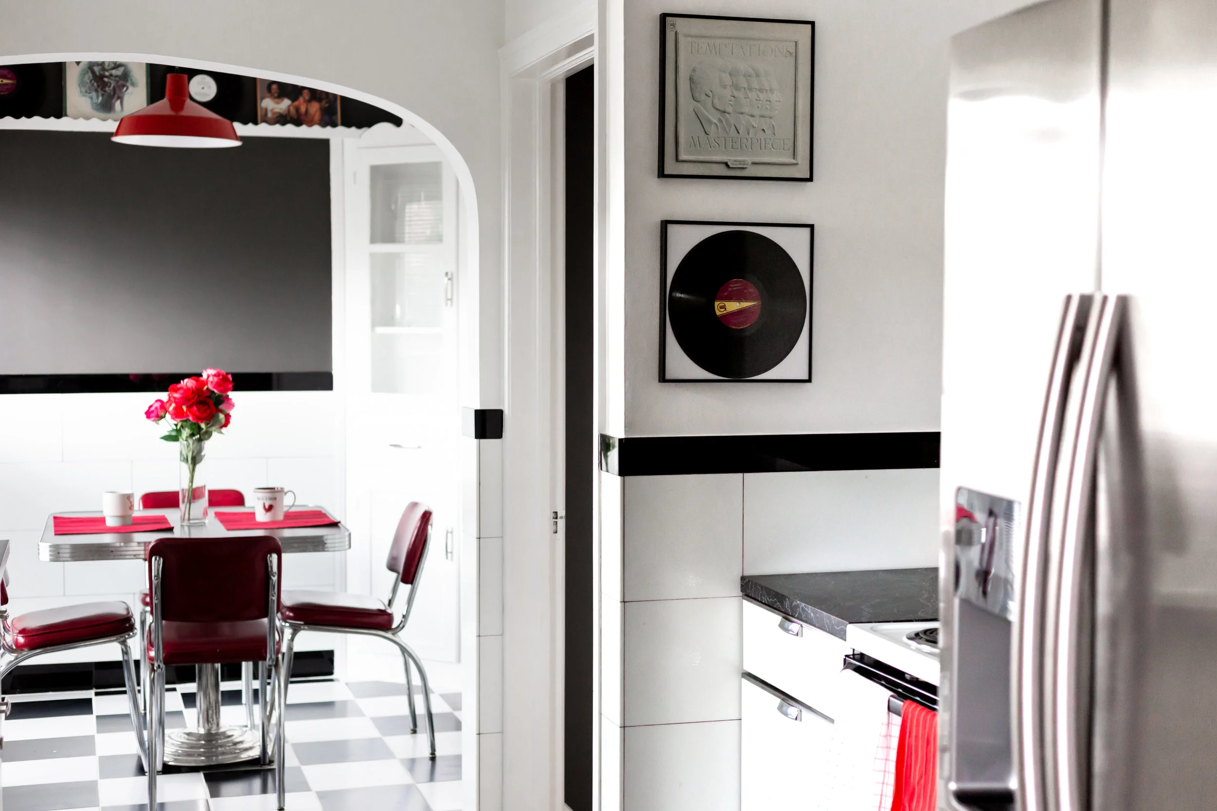 As an ode to my client's late father, we framed vintage Temptations albums - his favorite group.