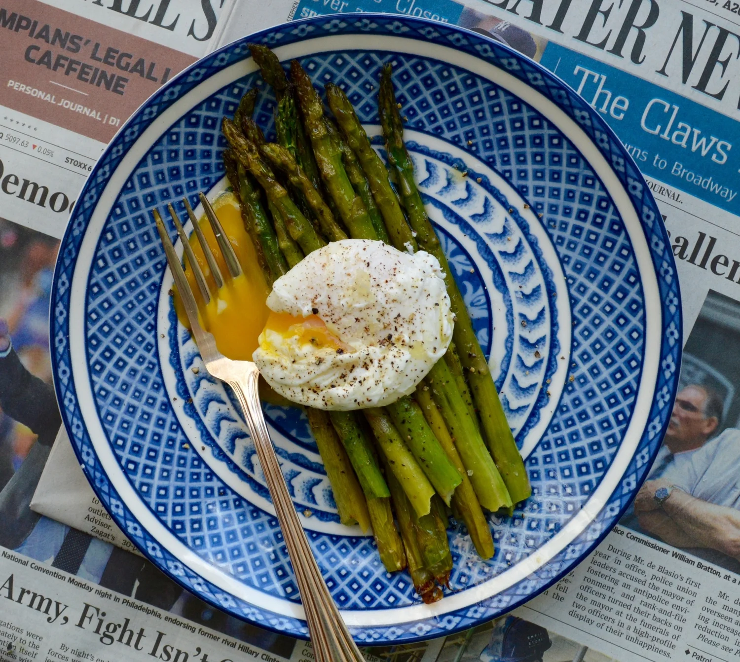 Roast asparagus with a runny poached egg