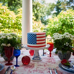Cake Wrapped in  Flag Chefanie Sheets , over red &amp; white toile tablecloth. Photo Credit: William Jess Laird for The Daily Front Row
