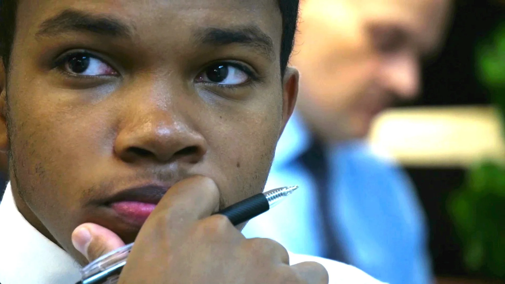 28 Strive guy with pen.jpeg
