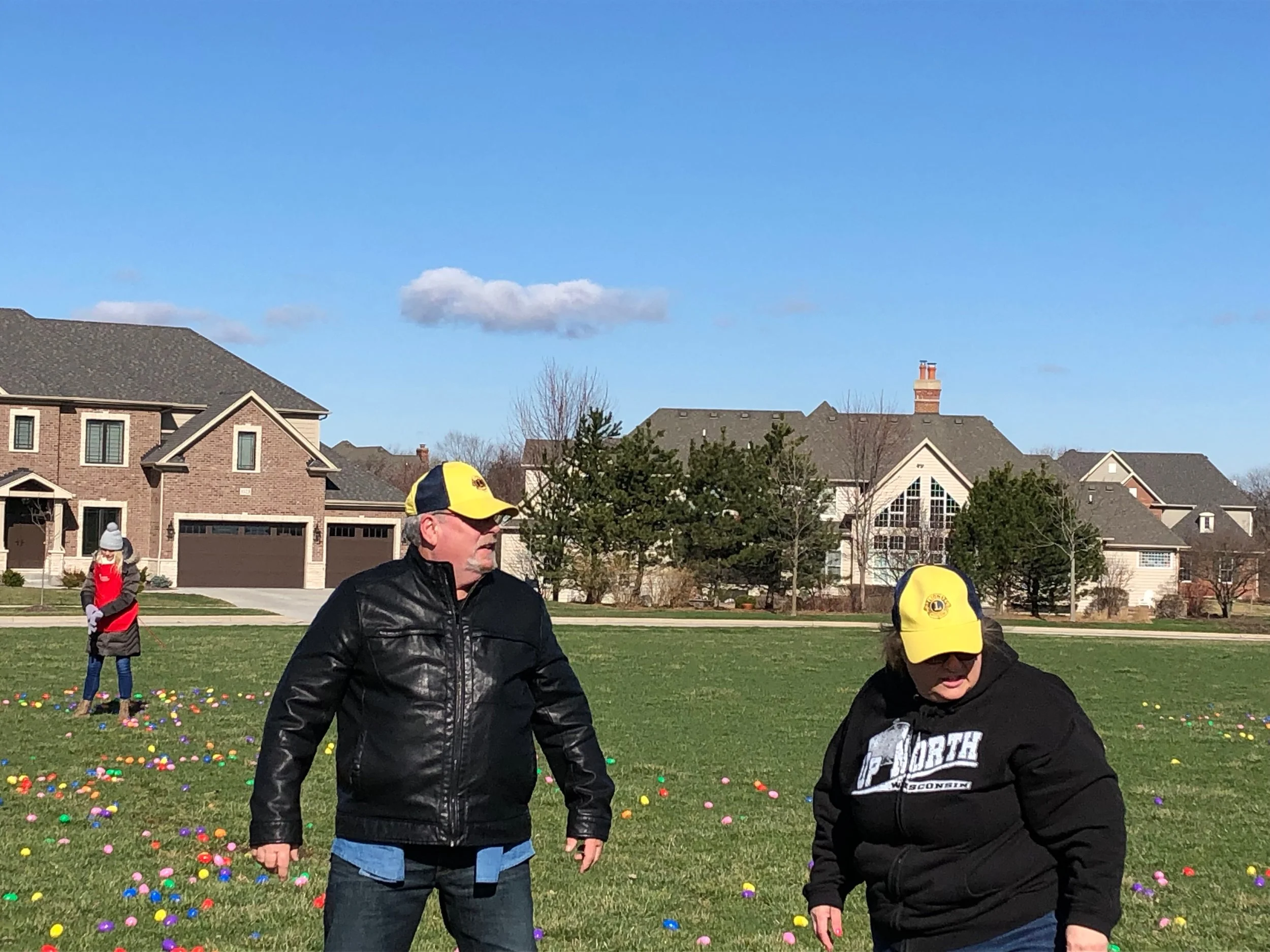 Lions Bill Hills and Paula Black helping with Easter Eggs