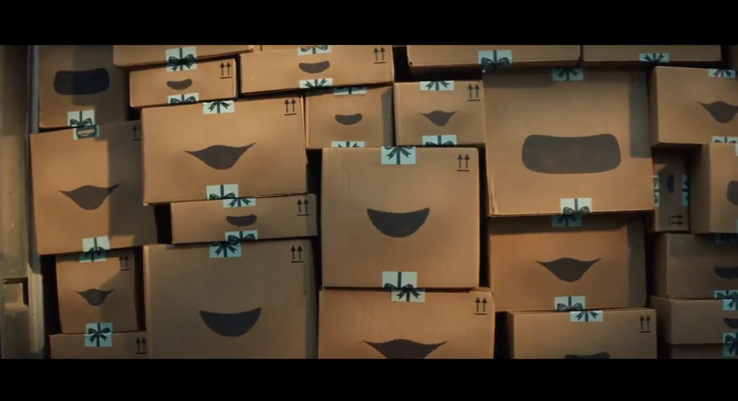 amazon-christmas-advert-2018-singing-boxes-can-you-feel-it-1541437976.png