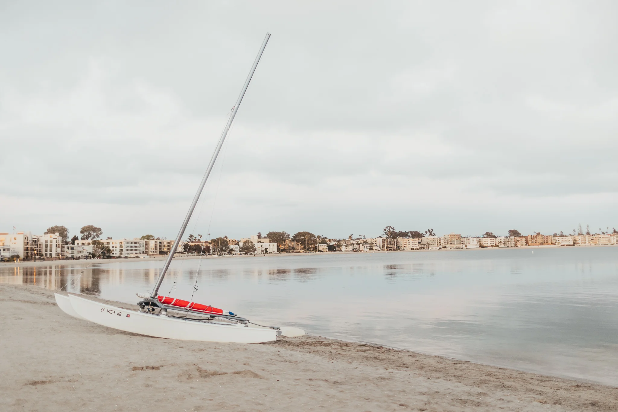 boat on the beach at Mission bay, in San Diego.