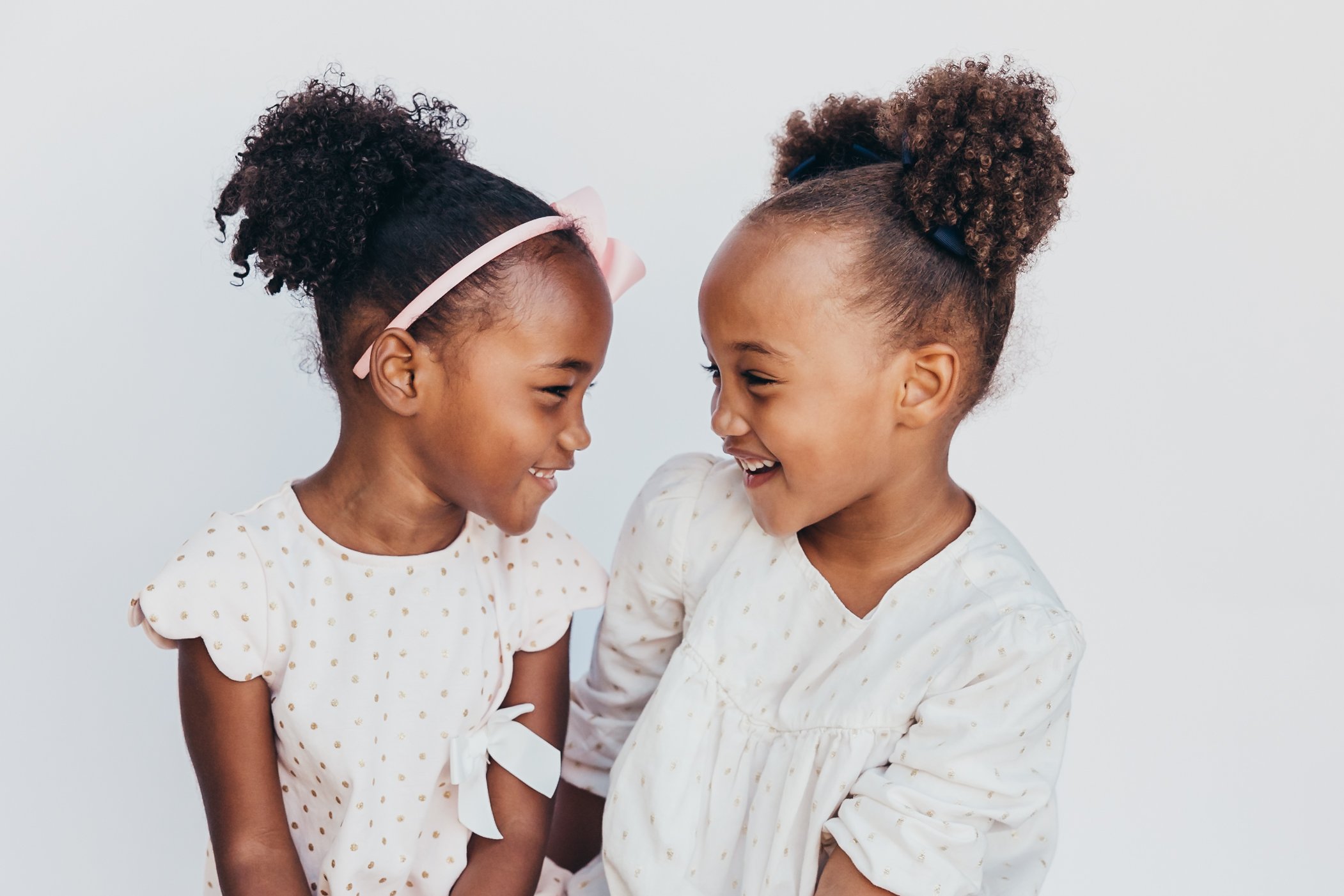 kid photos on white back drop in San Diego