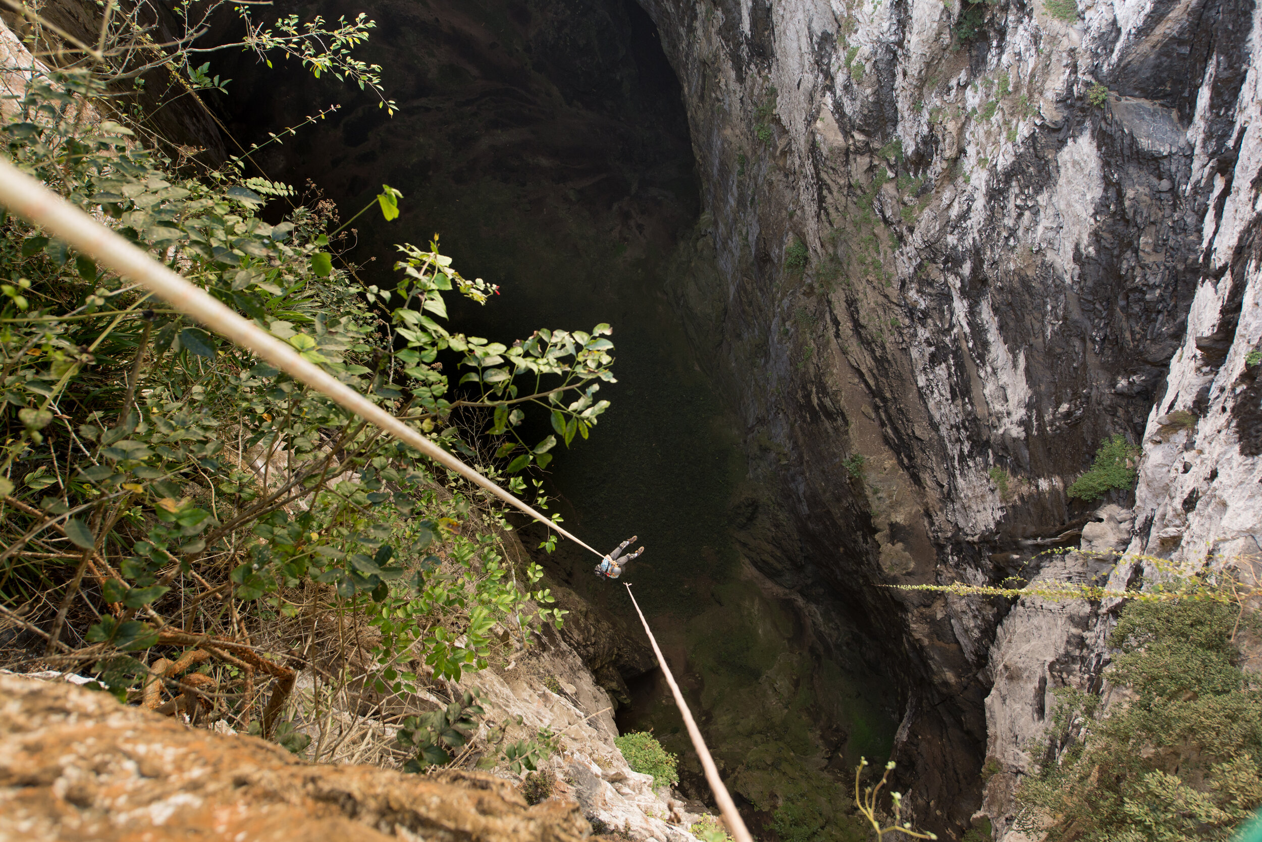  Ben floats through the empty space more than 600 feet above the cave floor. 