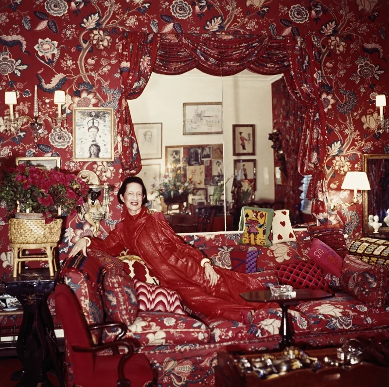 Diana Vreeland surrounded by red furnishings- series, 1979