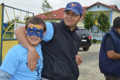 Claudiu and Cristi, one of our Sunshine School teachers, at a fun event at the school.