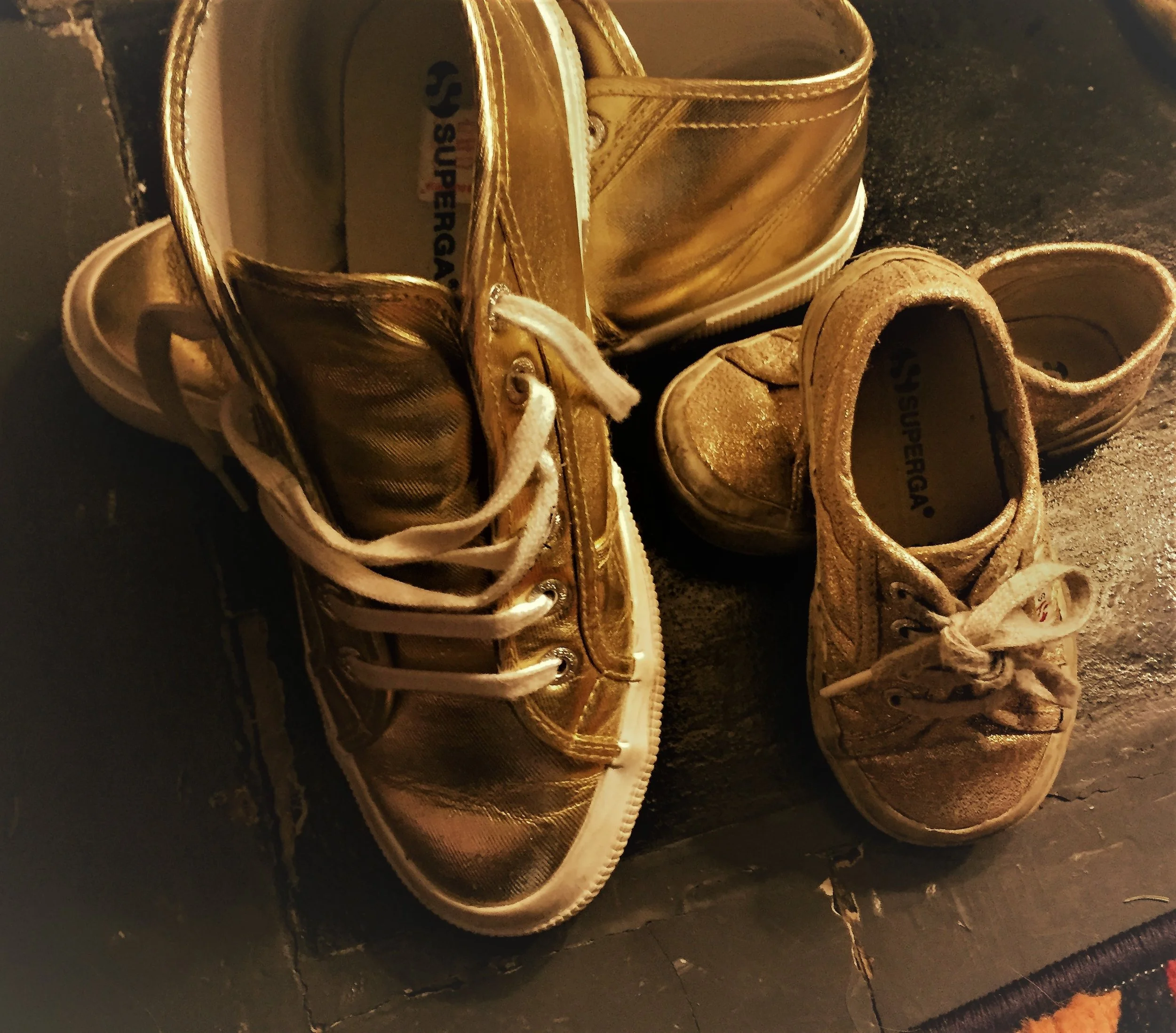 My new golden shoes and the matching ones for my granddaughter