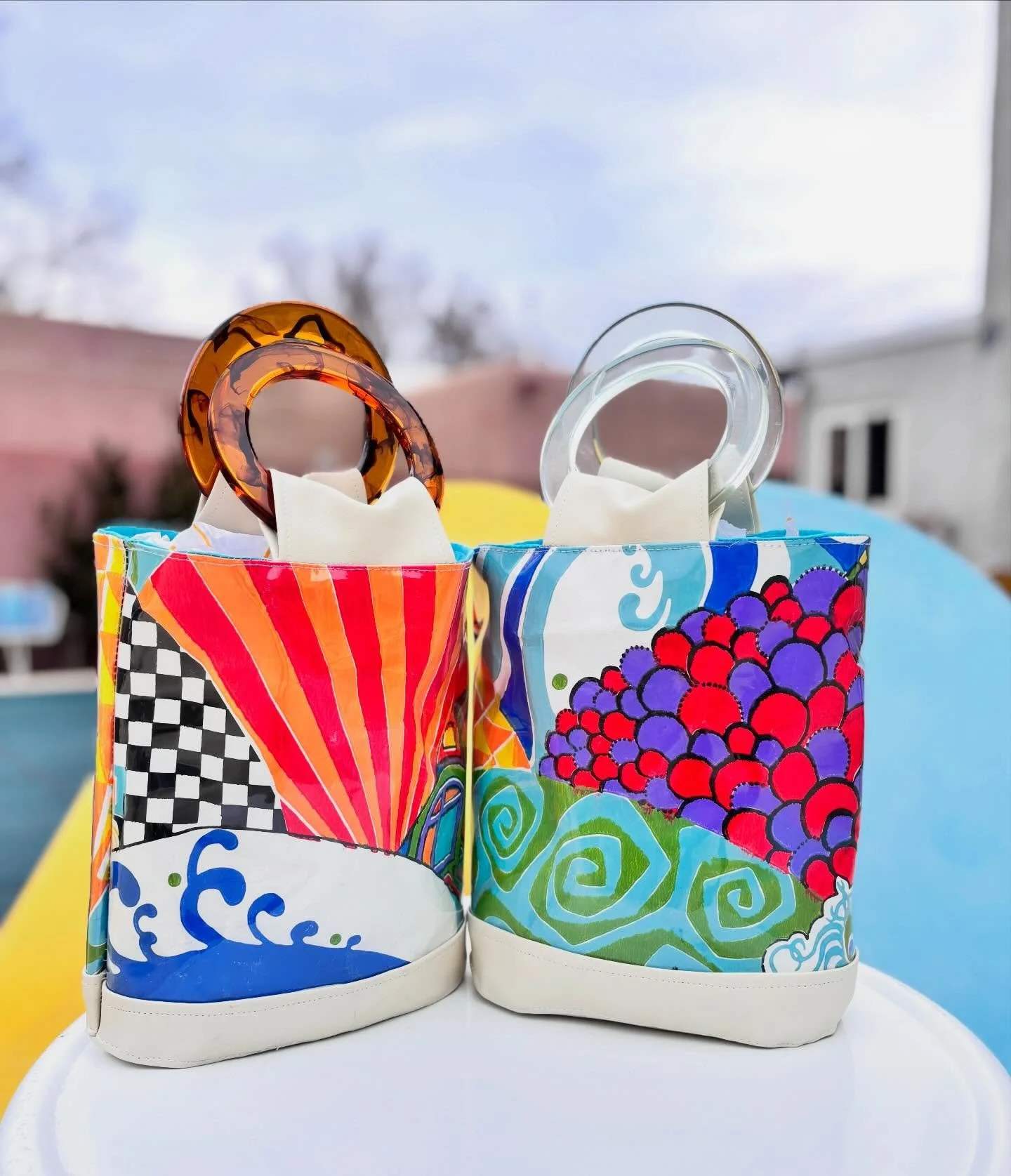 The leftover wallpaper, saved all these years, ended up in my hands. Scroll through to see the backs of the handbags and a peek at the bathroom where the wallpaper is still on the walls. Find the handbags at www.chellesummer.com and at @psvintagemark