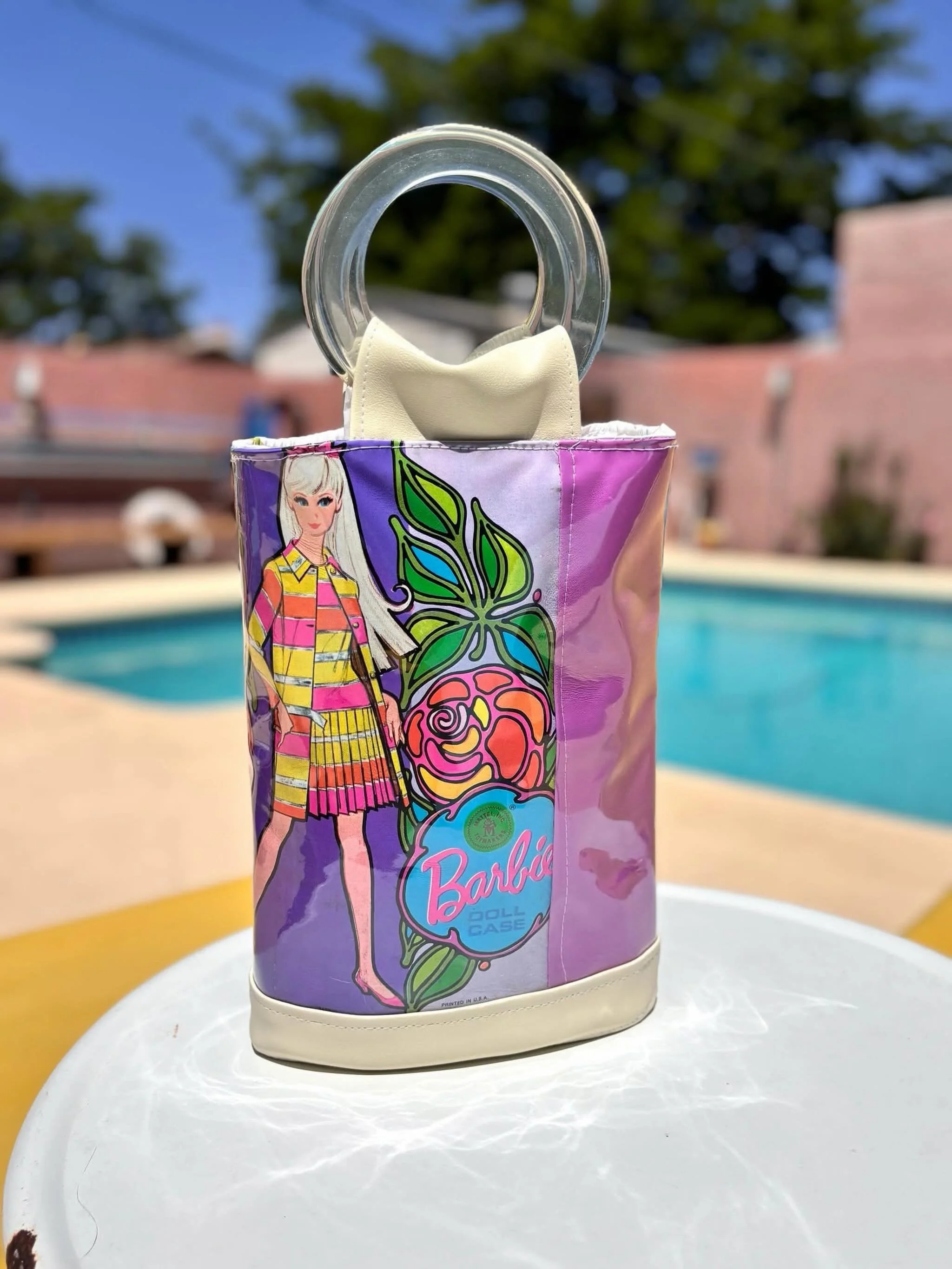 My favorite handbag from the fifteen vintage Barbie cases I bought. This one went to the guy who sold me the cases. He said he had a hard time deciding if he should part with the case, but seeing me turn it into a handbag gave it new life for him. I&