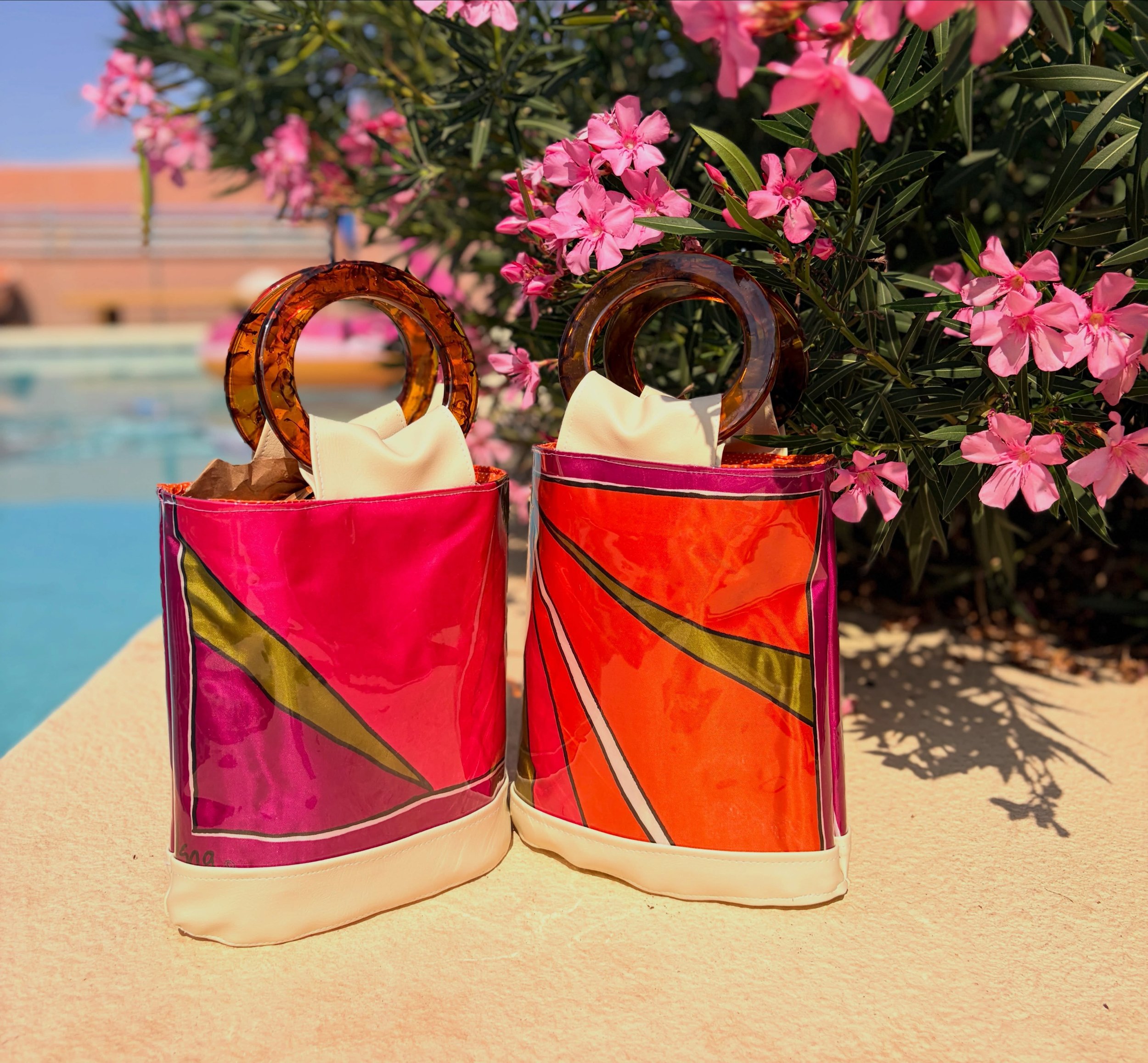 After a great trip, I&rsquo;m home...and there are some great Chelle Summer handbags currently on the web site. These two were made from a Vera Neumann scarf. You can see Vera&rsquo;s signature at the lower left of the bag on the left. The scarves ca