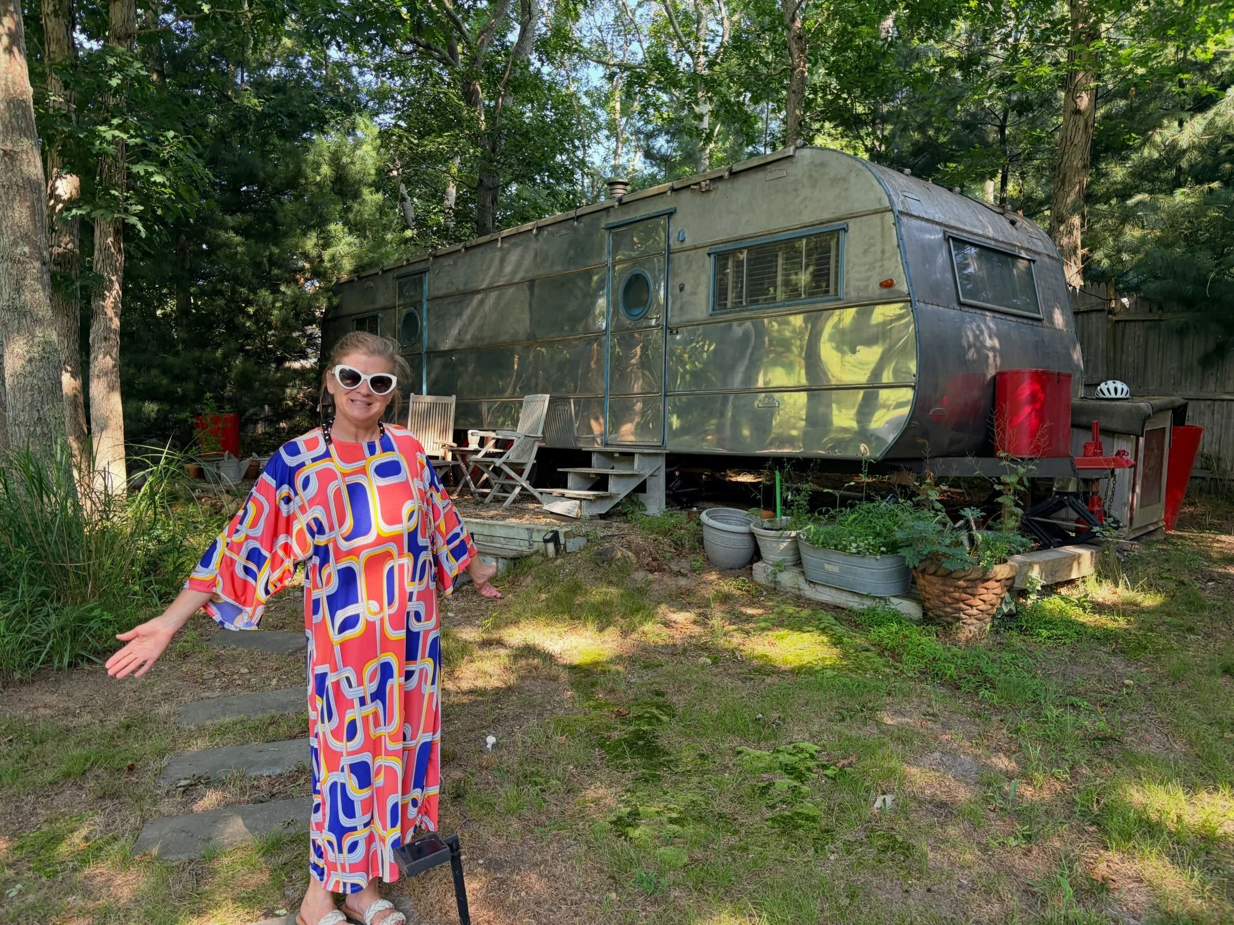To add a little adventure to our Hamptons weekend, we stayed in a restored 1950s Ironwood trailer, pictured here with a Chelle Summer caftan. The trailer and its location gave us the quiet I need to sleep between markets and we loved the outdoor show