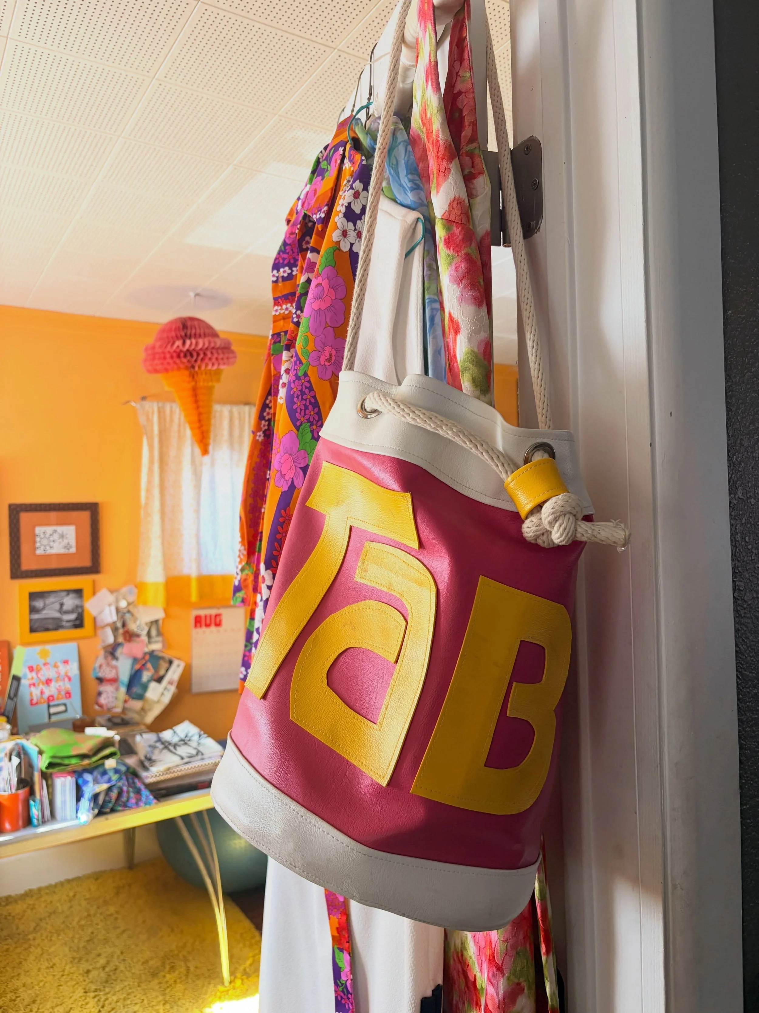 Sunday. My office- the first TaB bag I made- in the bucket bag style that launched Chelle Summer. I use it to travel what I need for the &ldquo;winter pool&rdquo; (@genesis_midtown). My desk was our kitchen table growing up. My parents bought it when