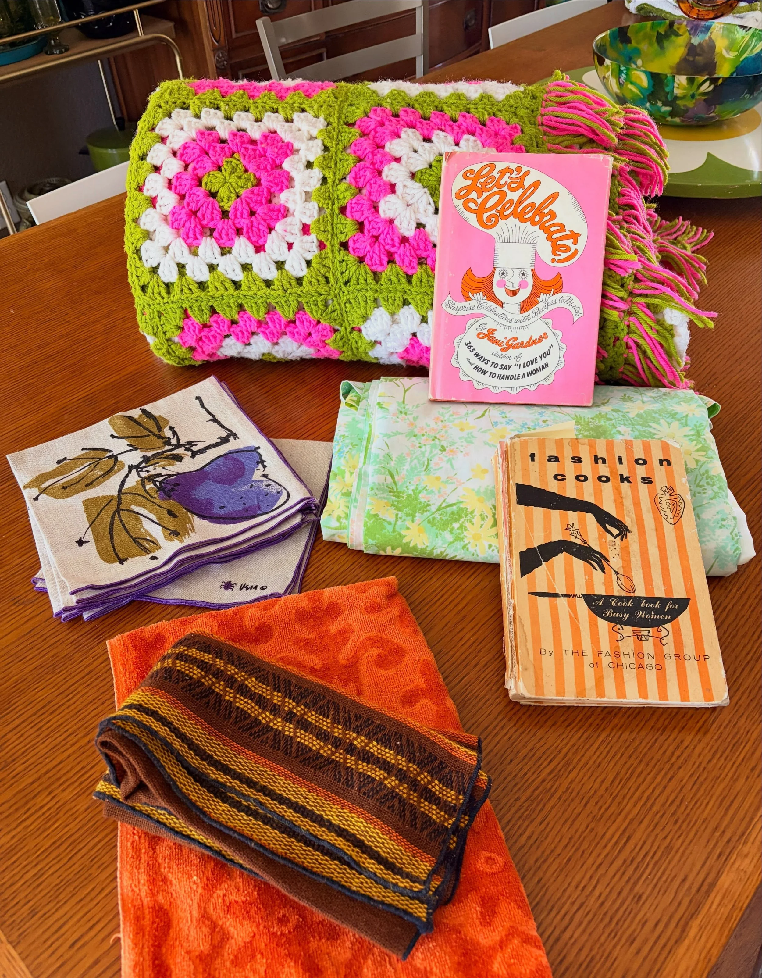 I picked up some odds and ends at a few estate sales this morning. I usually don&rsquo;t buy afghans but it was so hard to resist those colors. The woman said her grandmother- whose name was Margarita- made it. I don&rsquo;t think the napkins were ev