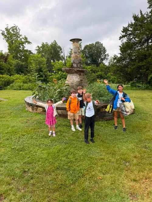 Volunteers and students in the garden