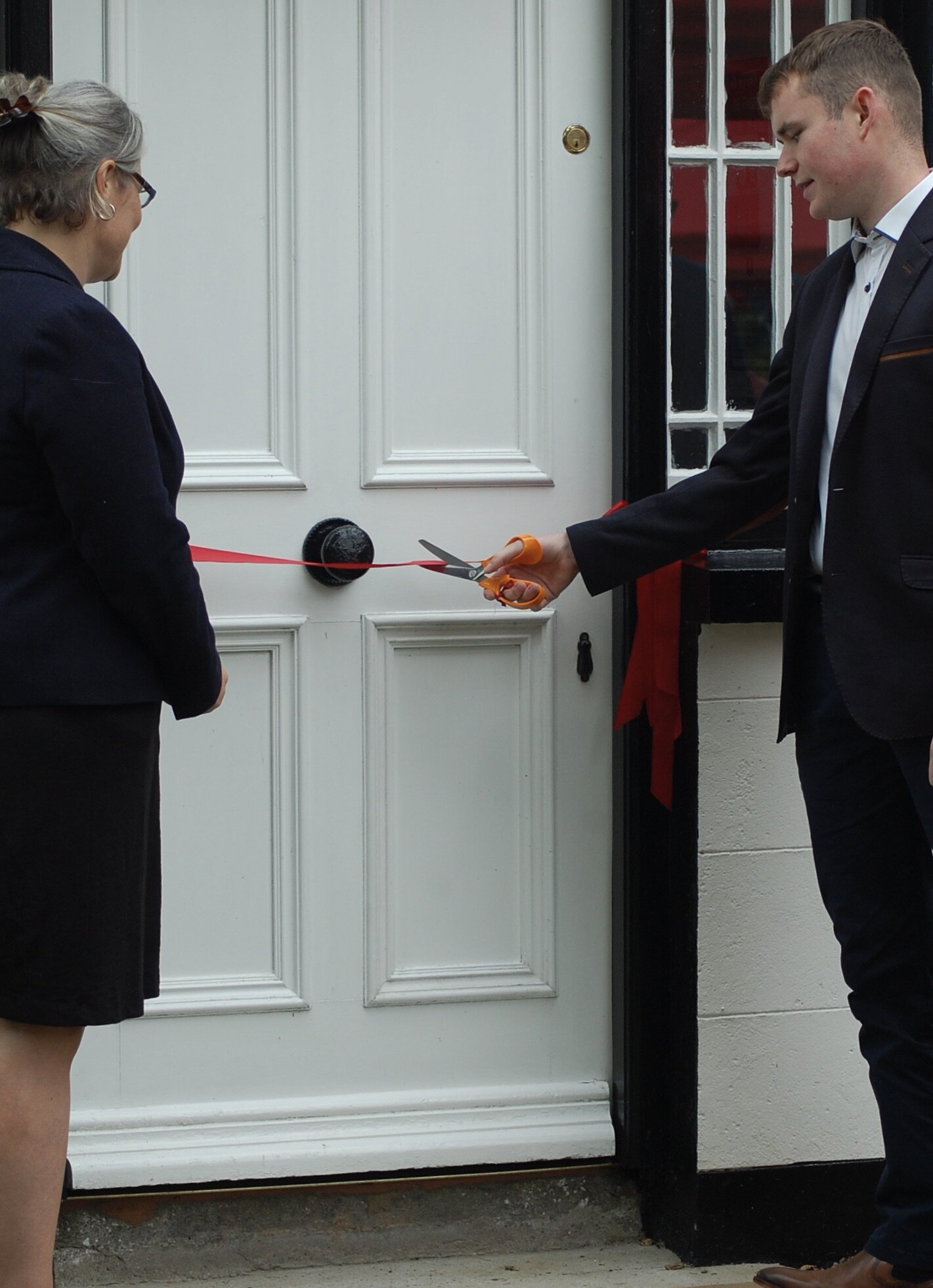 Deputy High Commissioner opening the House with Jack Ballance Wallace, descendant of Premier John Ballance