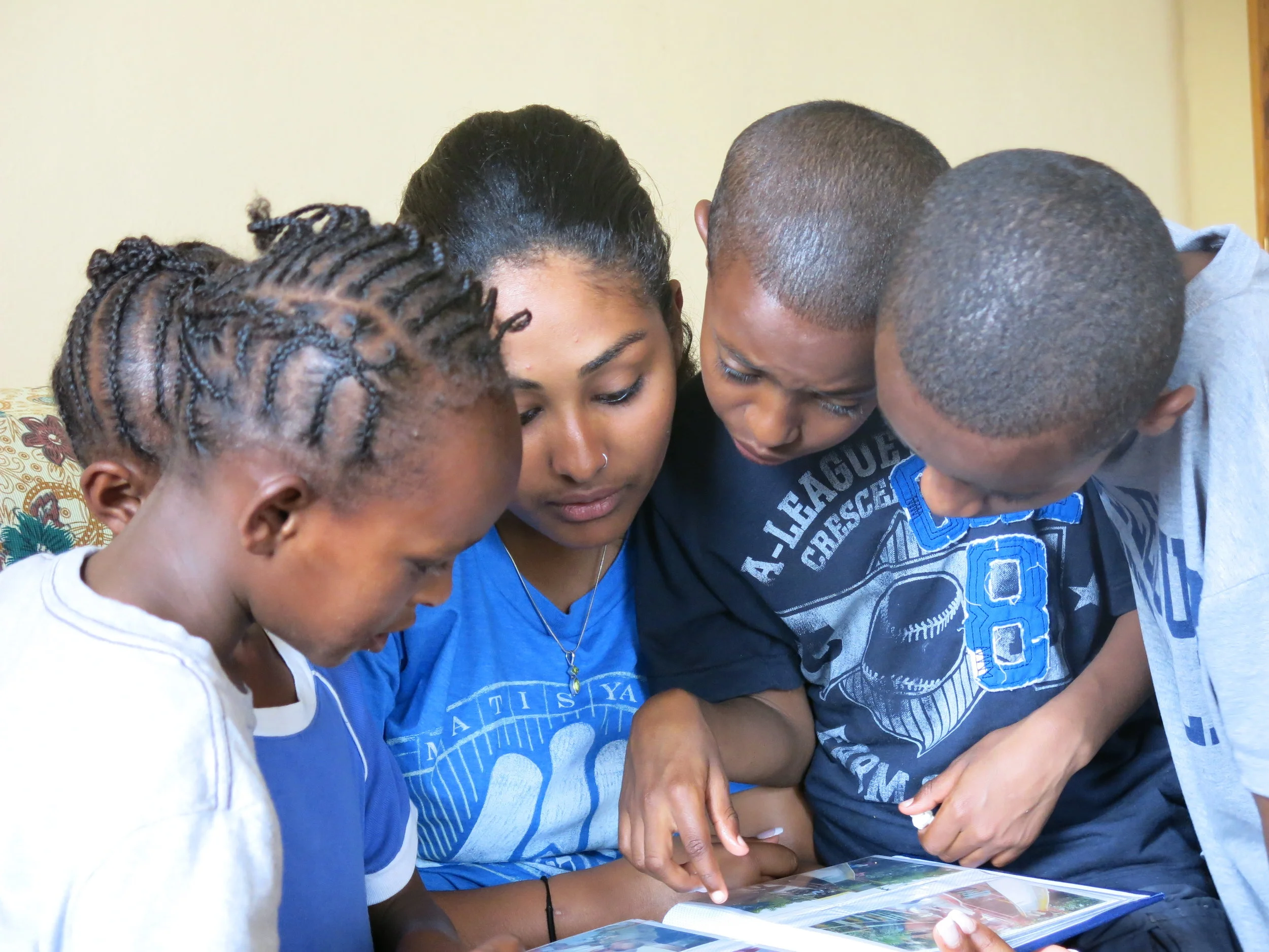 It's so important to know you belong somewhere. Betasab children love sharing their family photos.