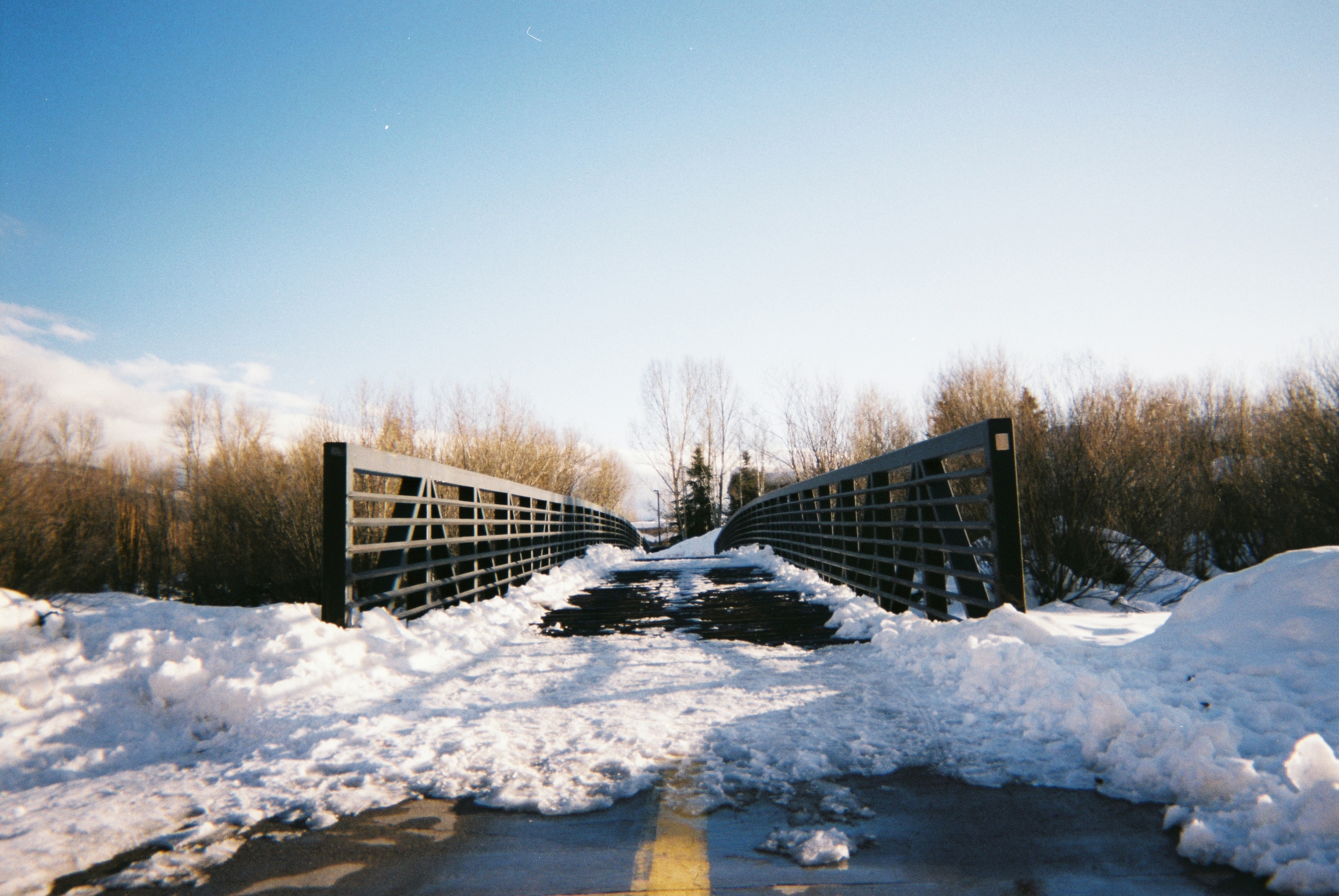 AN INVITATION In our life journeys, we are always on the precipice of a new adventure. God invites us to cross the bridge into the unknown. Whether we walk, run, skate, or crawl, whether it takes us five seconds or five years to make it across, the journey is beautiful. The photograph is a celebration of that journey. -Georgi Hicks