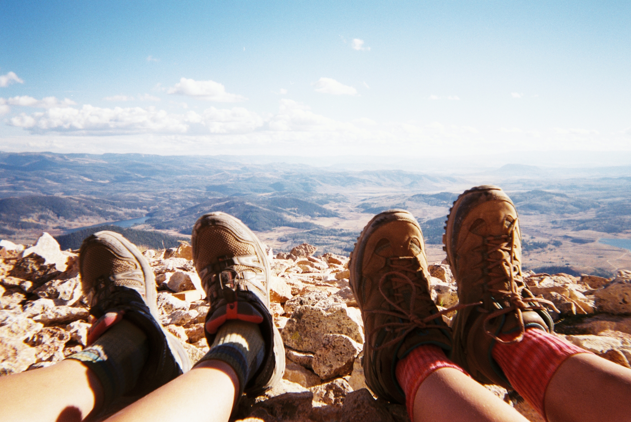 ENJOYING CREATION This is Brittany’s and my feet on the top of Hahn’s Peak in North Routt, looking south towards Steamboat Springs. Upon reaching the summit, we were instantly in awe of the splendor of creation that was laid out before us. I have always seen God most clearly in the natural world, and hiking to a point like this immerses you in that world and feels like stepping into a huge, perfect cathedral. - Harlowe Wang