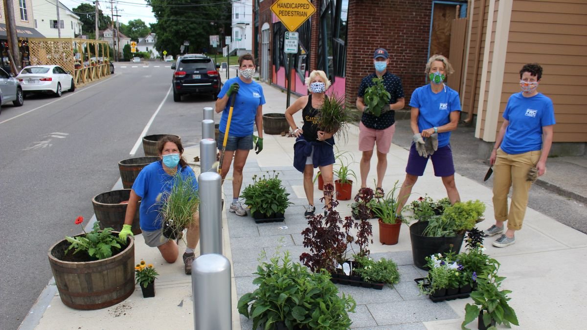 Planters with volunteers.jpg