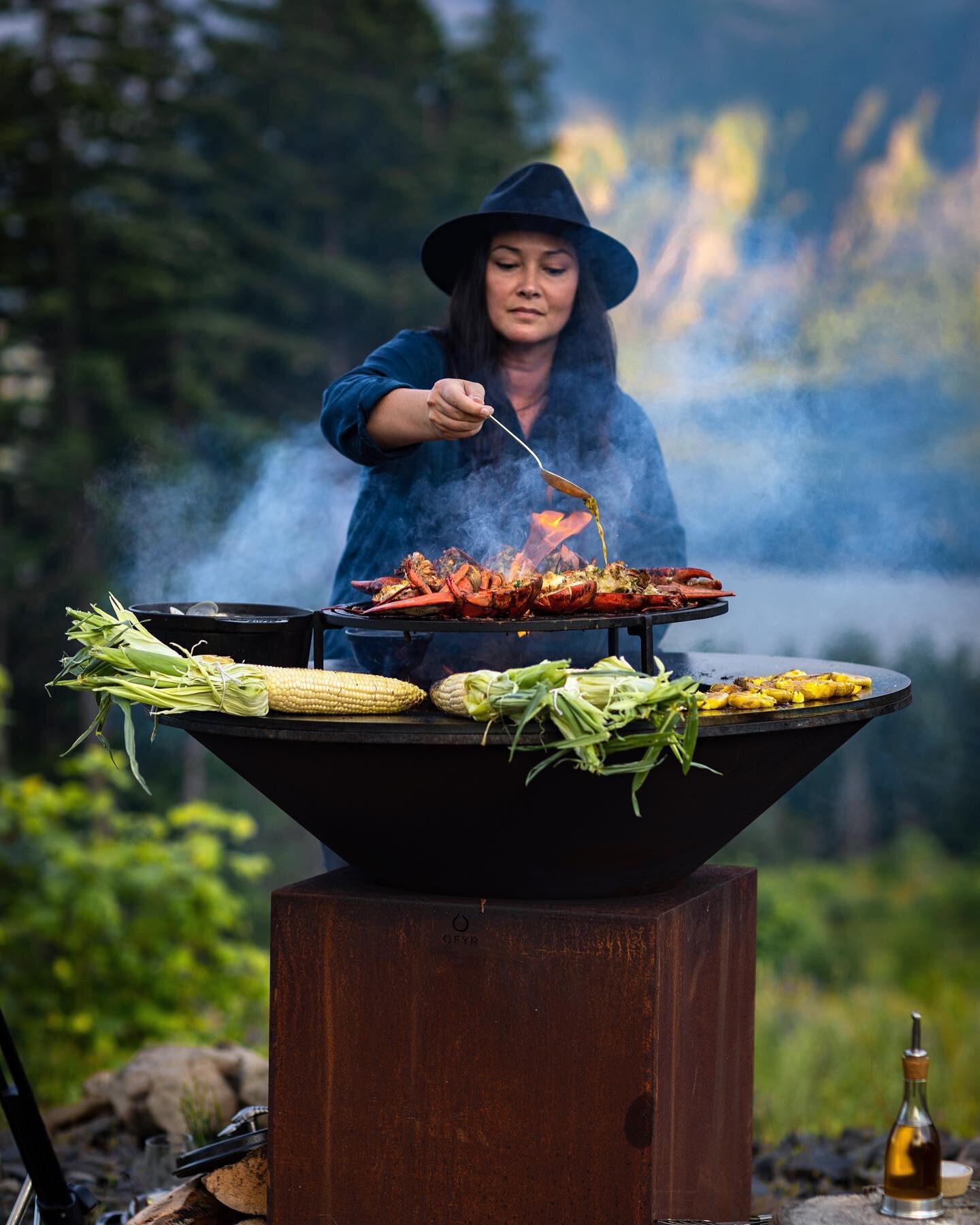 A clambake is the ultimate summer feast, so why should East Coasters have all the fun? For our PNW version, we fire roasted Maine lobsters, steamed local clams in sake, charred ears of corn and crisped up some smashed new potatoes&mdash;all on our ep