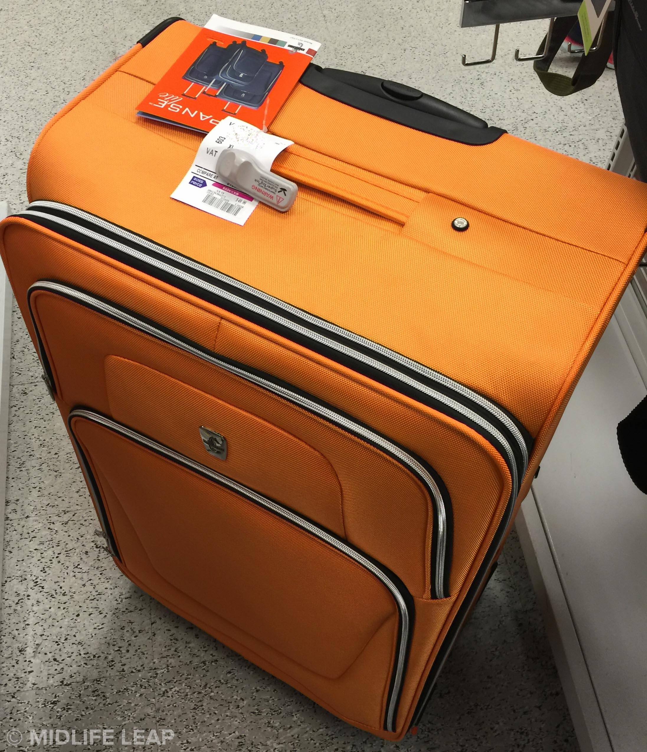 The giant orange suitcase