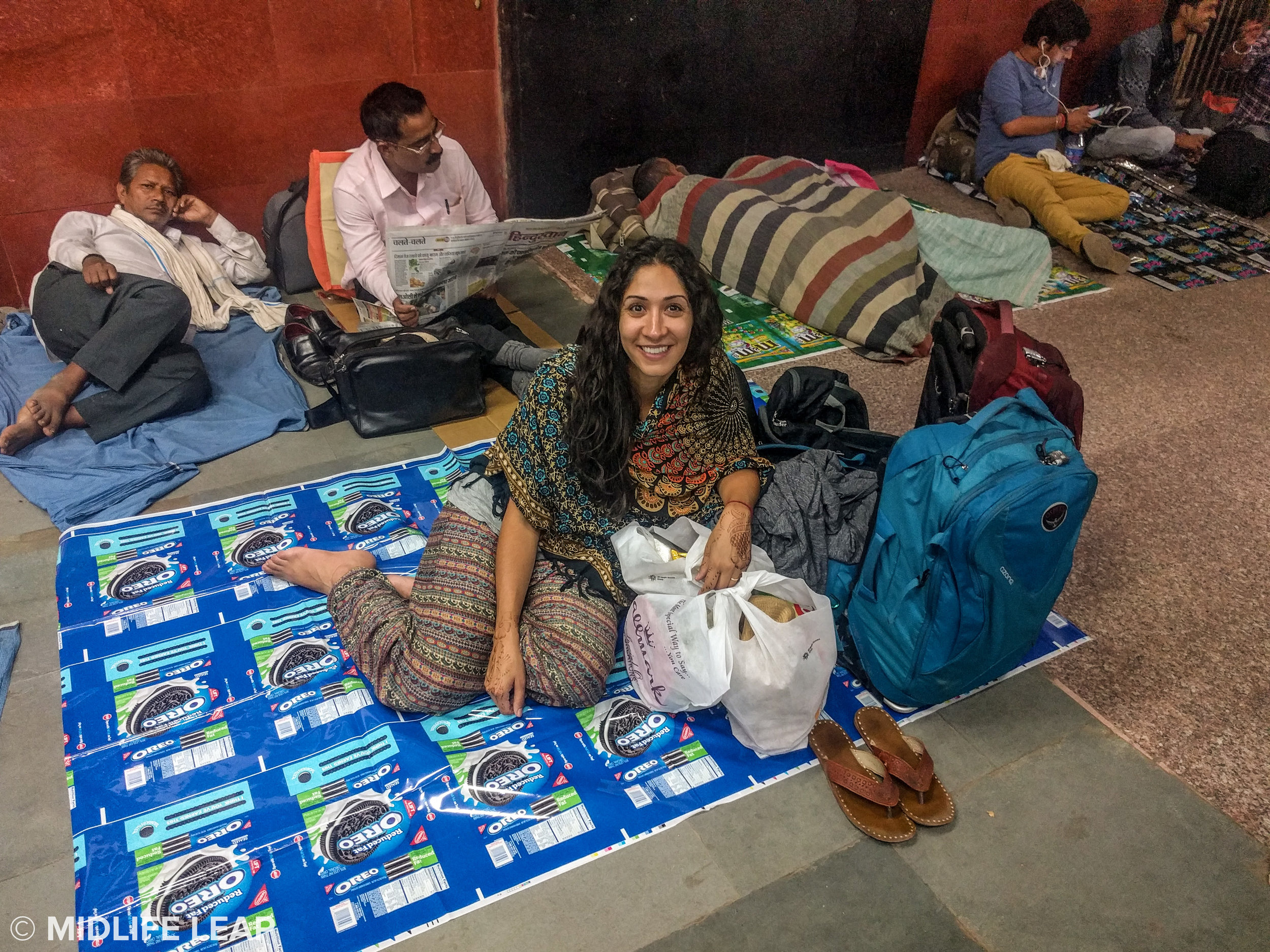 Brian scored this awesome plastic Oreo blanket for us to sit on (for four hours while waiting on our very delayed train)