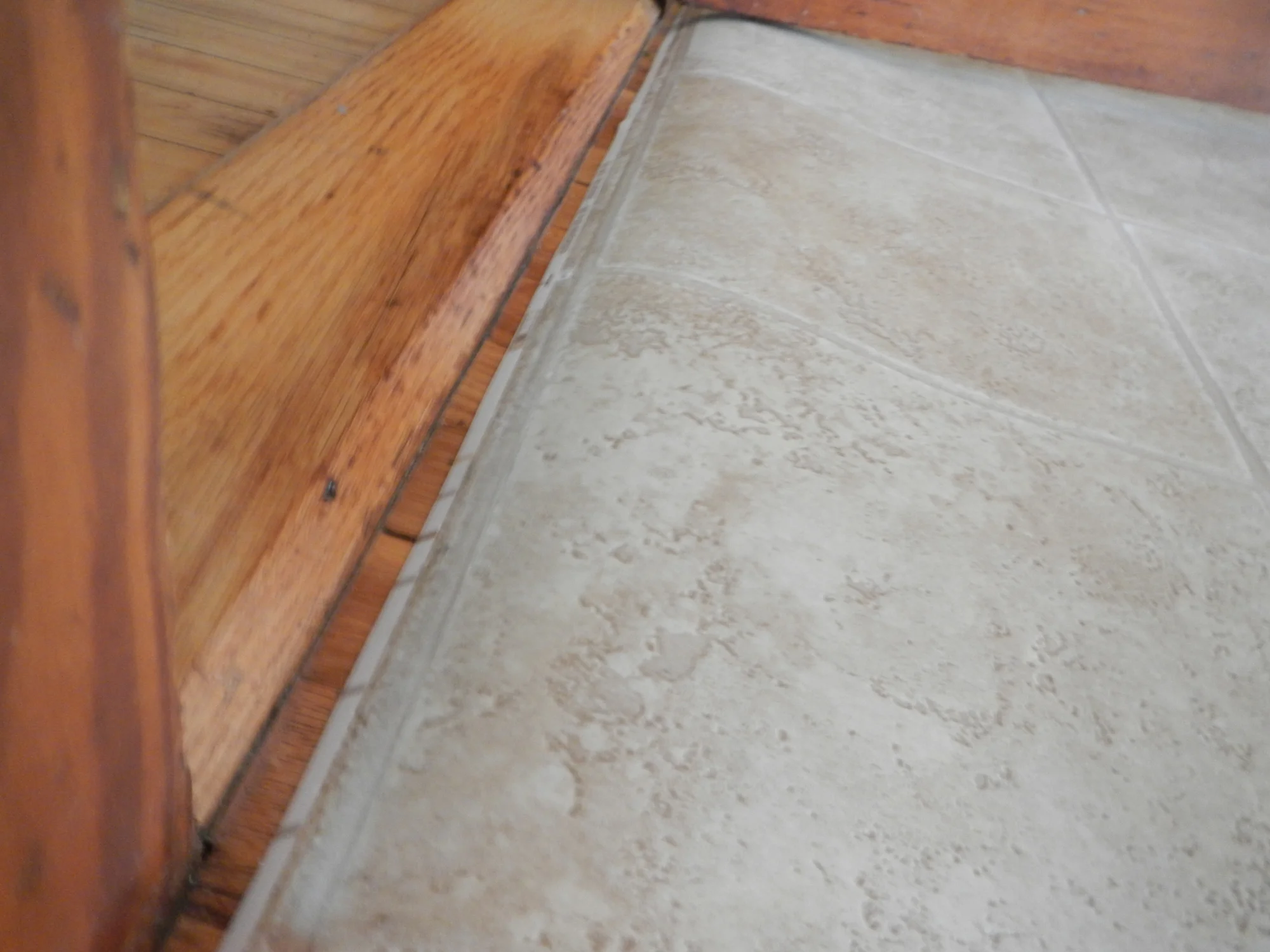 Rolled flooring tends to keep it's curl for a while and that can be a danger to feet.