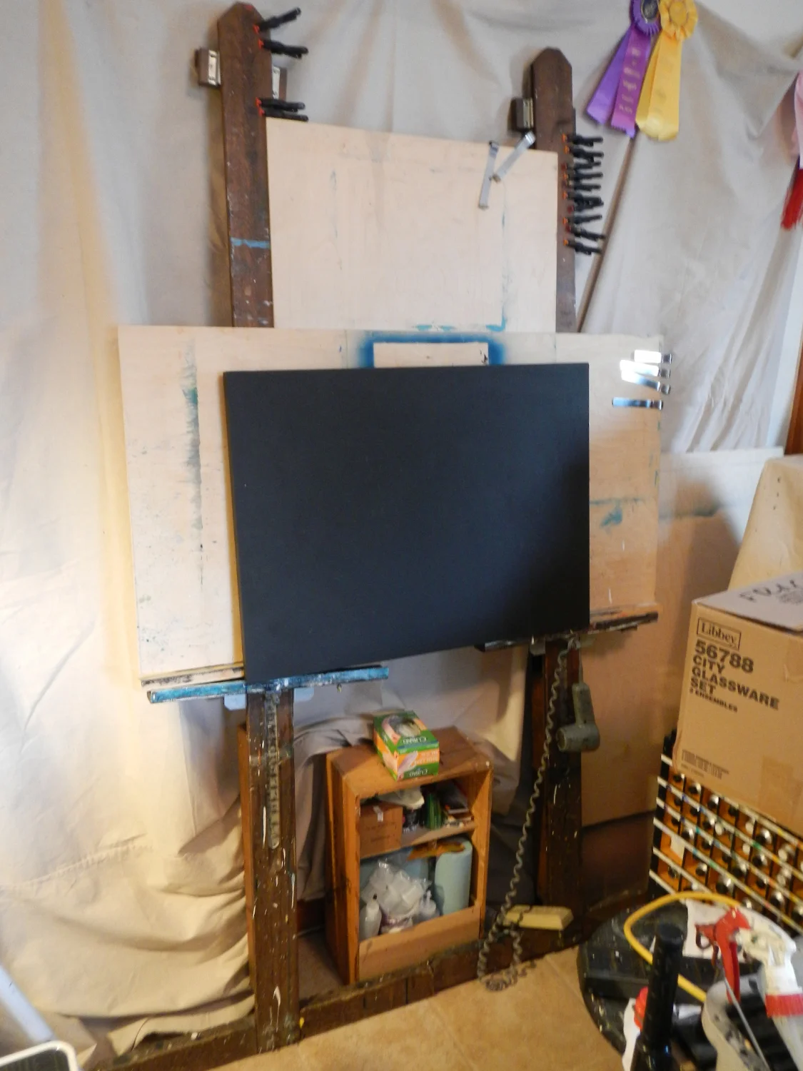 All together, it makes a cheap but sturdy easel.
