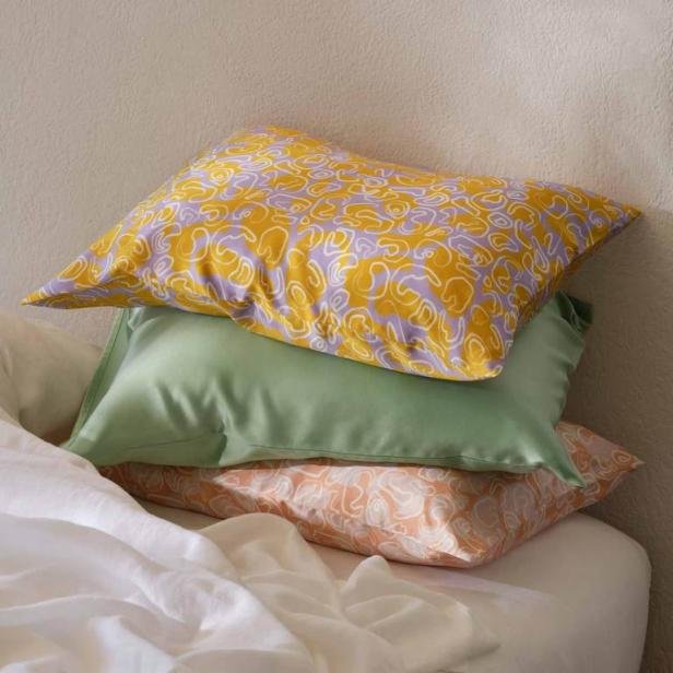 Domino, We Love That the Best Pillowcases Aren’t Matchy-Matchy With Bedding