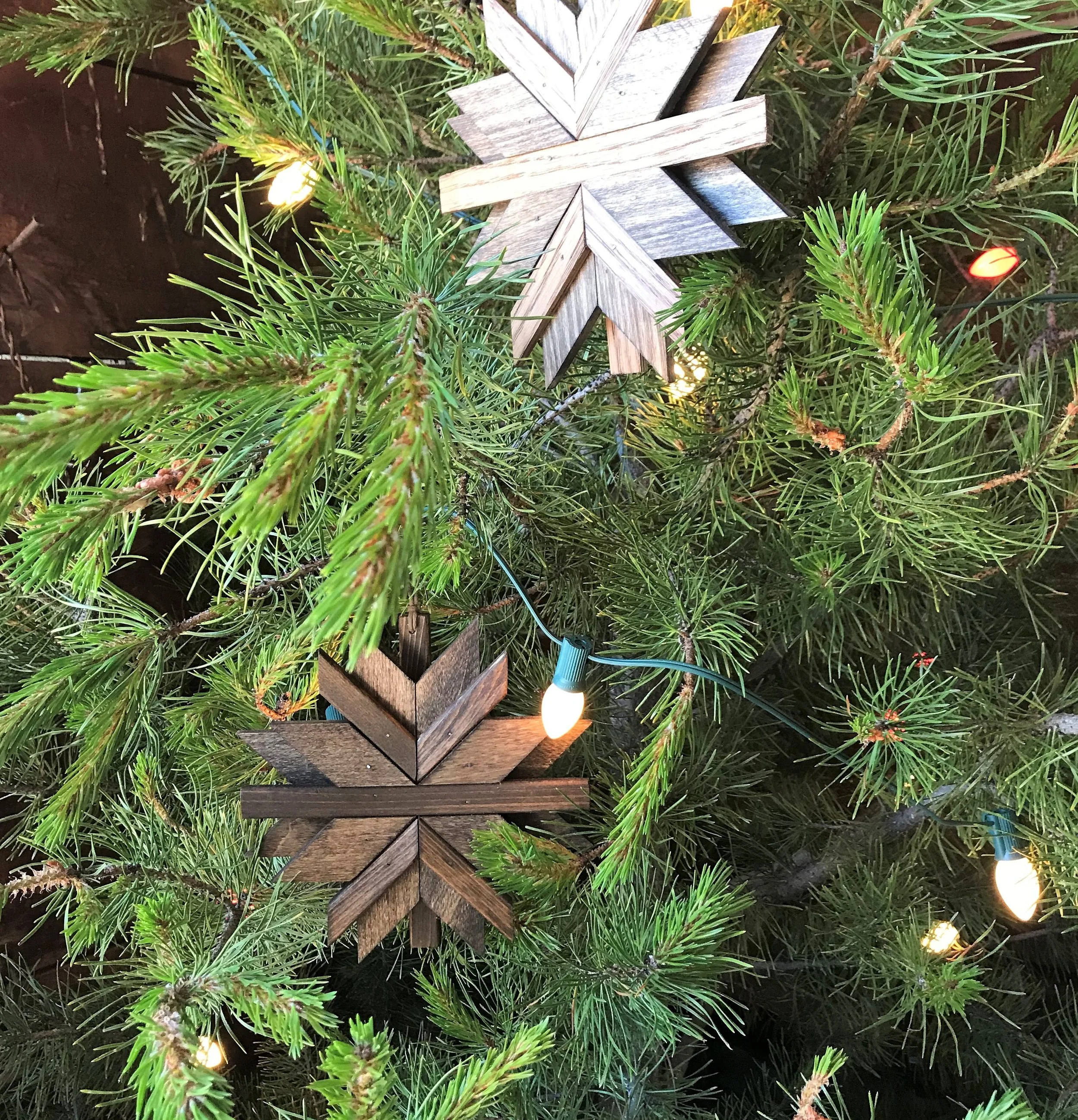 wooden snowflake ornaments on tree 1.jpg