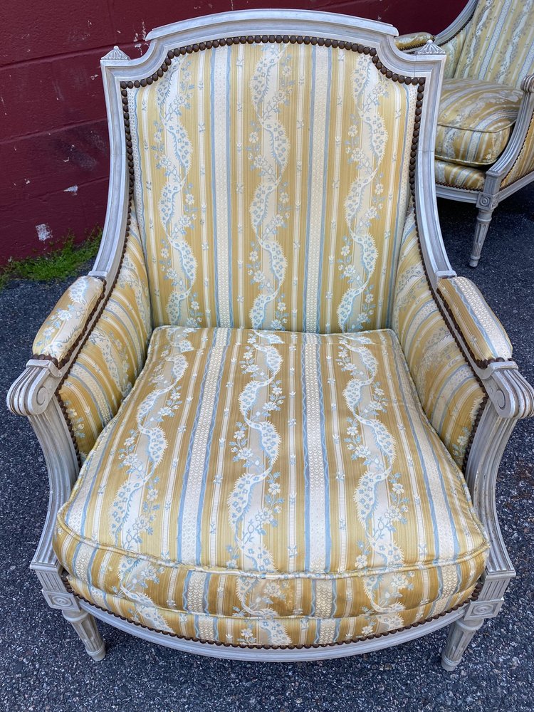 Pair of french louis xv style wooden yellow striped upholstered armchairs