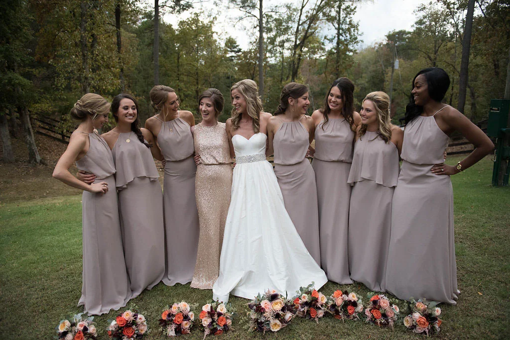 Sarah Beth selected a dress for her maid of honor that was glittery gold. Photo: Katie Wallace