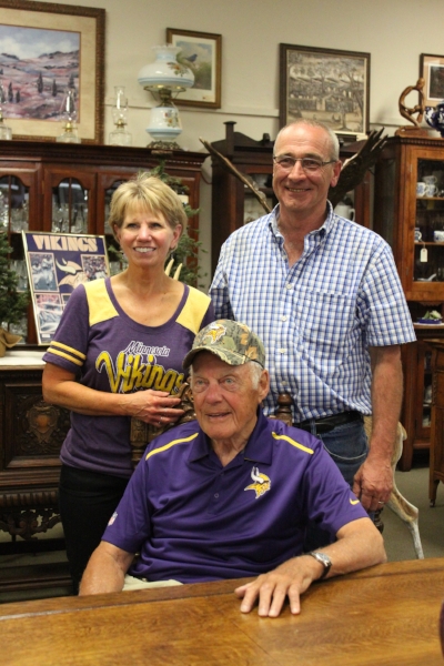 Mr. Bud Grant with store owners Jeff and Lynelle Lanoue.