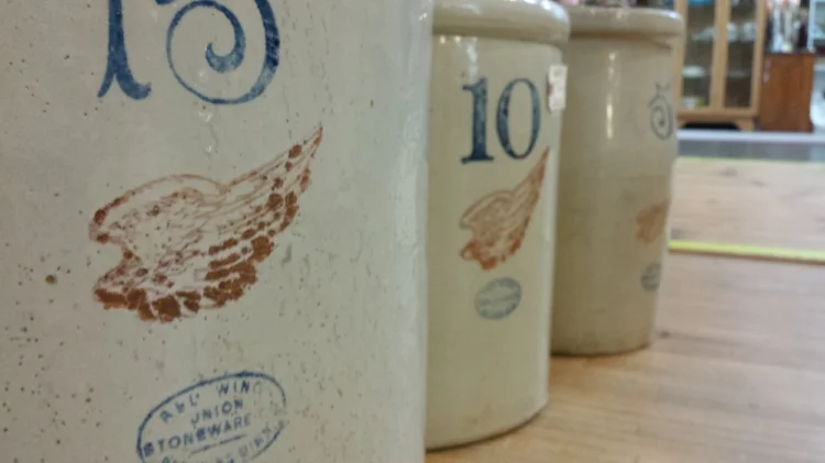 The famous red wing stamp was adopted as the the company's official trademark in 1906.
