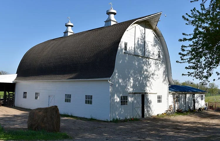 The Fred and Rosa Fulton Barn, a historical barn in Iowa, features two cupolas with weather vanes.