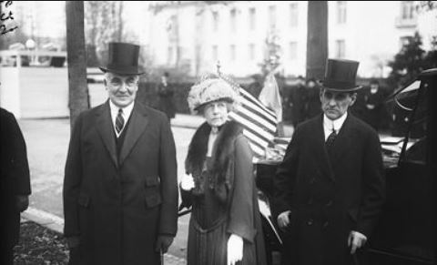  Warren G. Harding wears a now collectible top hat. 