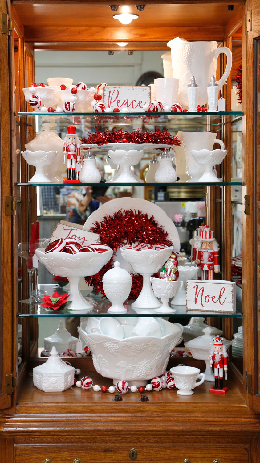 Past and Present Home Gallery collectible milk glass on display
